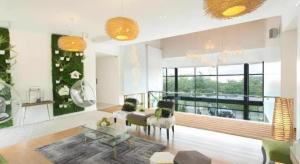 a living room with a couch and a table at Venue 88 in Dulongabong