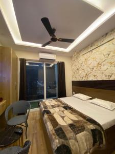 En eller flere senge i et værelse på CRS property