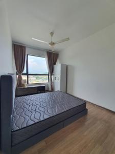 Ένα ή περισσότερα κρεβάτια σε δωμάτιο στο JT Homestay