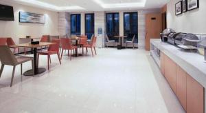 Kuchyň nebo kuchyňský kout v ubytování City Comfort Inn Changsha Outlets Datuo Metro Station