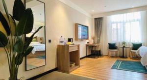 TV a/nebo společenská místnost v ubytování GreenTree Inn Express Bozhou Woyang County Huaizhong Avenue Zhonghai International
