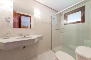 Ένα μπάνιο στο Pousada Joia da Serra by Hotel Platanus +53 φωτογραφίες