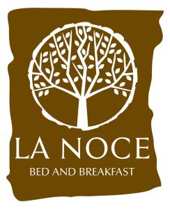 um logótipo para um alojamento de acomodação e pequeno-almoço com uma árvore em La Noce Bed and Breakfast em Chieti