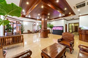 TV a/nebo společenská místnost v ubytování Domi Hotel