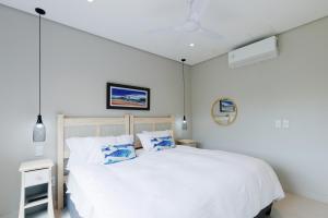 Ένα ή περισσότερα κρεβάτια σε δωμάτιο στο 17 Husk, Zululami Estate +12 φωτογραφίες