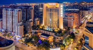 an aerial view of a city at night at Regency Hotel in Ma Yu