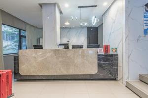 Ο χώρος του λόμπι ή της ρεσεψιόν στο Jinjiang Inn Cixi Intime City Shanglinfang Pedestrian Street