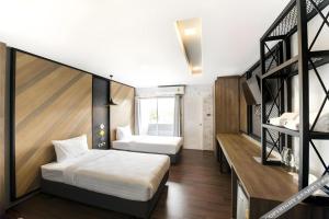 Giường trong phòng chung tại The Circle Hotel +121 ảnh