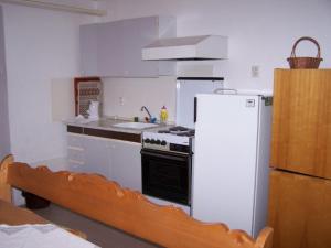 Kuchyň nebo kuchyňský kout v ubytování Robotnícka ubytovňa Bodice 104