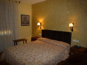 Postel nebo postele na pokoji v ubytování Hotel Las Truchas