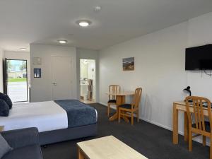 Μια τηλεόραση ή/και κέντρο ψυχαγωγίας στο ASURE Central Gold Motel Cromwell