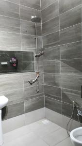 Koupelna v ubytování D'Savanna Homestay Gerik