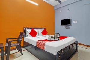 Ένα ή περισσότερα κρεβάτια σε δωμάτιο στο Hotel O FOURTEEN