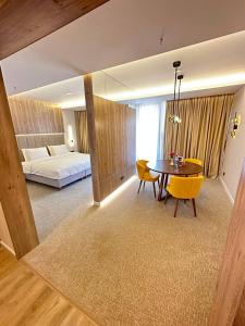 Postel nebo postele na pokoji v ubytování Apart Hotel Istaravshan