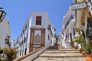 a group of stairs leading up to a building at Casa Marina in Frigiliana