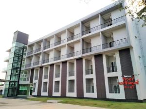 an exterior view of the front of a building at River Residence Saraburi Hotel in Ban Kok (1)