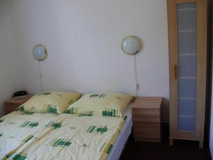 Postel nebo postele na pokoji v ubytování Penzion Dana Troja
