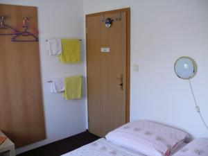 Postel nebo postele na pokoji v ubytování Penzion Dana Troja