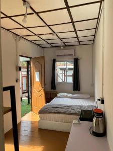 Postel nebo postele na pokoji v ubytování BN Residence