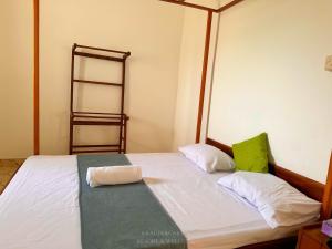 Una cama o camas en una habitación de Krautergarten Resort & Wellness