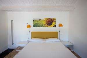 A bed or beds in a room at Il Portico