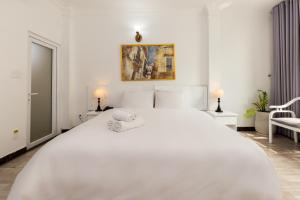 Ліжко або ліжка в номері Kas Premium Hotel