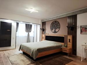 Giường trong phòng chung tại Bulevard 11