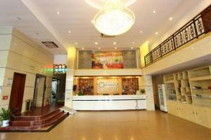 Ο χώρος του λόμπι ή της ρεσεψιόν στο Yi Mi Hotel Shenzhen Longgang Pinghu South China City