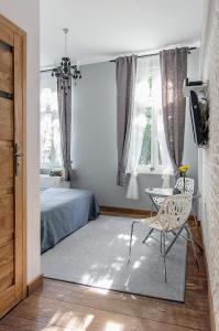Posteľ alebo postele v izbe v ubytovaní Apartament Wierzbięcice
