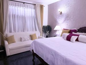 Ένα ή περισσότερα κρεβάτια σε δωμάτιο στο Bernies Blue Heaven +31 φωτογραφίες