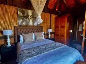 Ένα ή περισσότερα κρεβάτια σε δωμάτιο στο House 23 Ezulwini in Sodwana Bay Lodge +58 φωτογραφίες