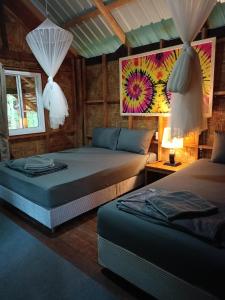 Postel nebo postele na pokoji v ubytování Dahla Lanta Hut