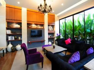 Χώρος καθιστικού στο Bonito Chinos Hotel