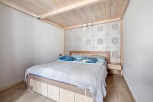 Llit o llits en una habitació de Central Krak Apartments