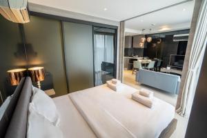 Postel nebo postele na pokoji v ubytování Seaphere Residence by Prop Hopper