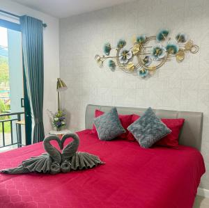 Una cama o camas en una habitación de TN KAMALA Room For Rent