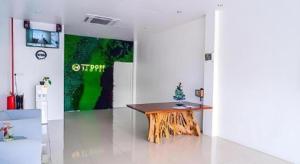 Una televisión o centro de entretenimiento en TT Dorf Hotel (Taiping)