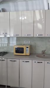 Kjøkken eller kjøkkenkrok på Apartament Violet