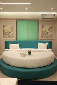 Ένα ή περισσότερα κρεβάτια σε δωμάτιο στο Hotel Casa Gold +16 φωτογραφίες