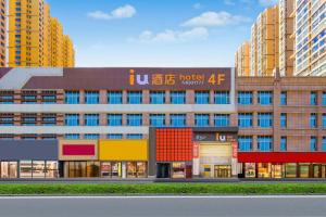 a rendering of a hotel building with buildings at IU Hotel Taiyuan Changfeng West Street The Mixc in Taiyuan