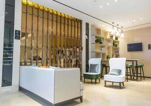 Μια τηλεόραση ή/και κέντρο ψυχαγωγίας στο City Comfort Inn Jingzhou Gongan Chengshi Square