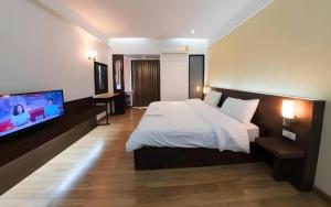 Postel nebo postele na pokoji v ubytování Next Bird Suite