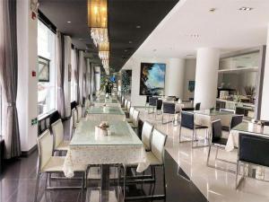 Un lugar para sentarse en Jinjiang Inn Tongli East China Commercial City