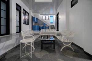 Χώρος καθιστικού στο OYO 94843 L2s Guest House Ii Syariah