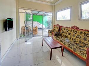 TV a/nebo společenská místnost v ubytování Capital O 93124 Lombok Northis Homestay