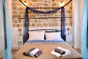 En eller flere senge i et værelse på Katia's Home