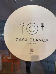 a sign for a casino blanca in a store window at Hotel Aqua Żyrardów in Żyrardów +7 photos