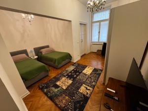 Ένα ή περισσότερα κρεβάτια σε δωμάτιο στο Casa TOMMASINI