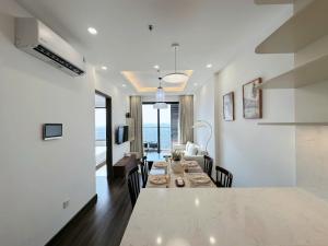 TV/trung tâm giải trí tại Hoàng Huy Commerce Võ Nguyên Giáp Mopius Apartment +44 ảnh