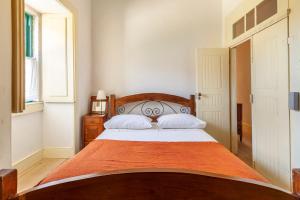 Giường trong phòng chung tại Quinta das Amendoeiras +9 ảnh